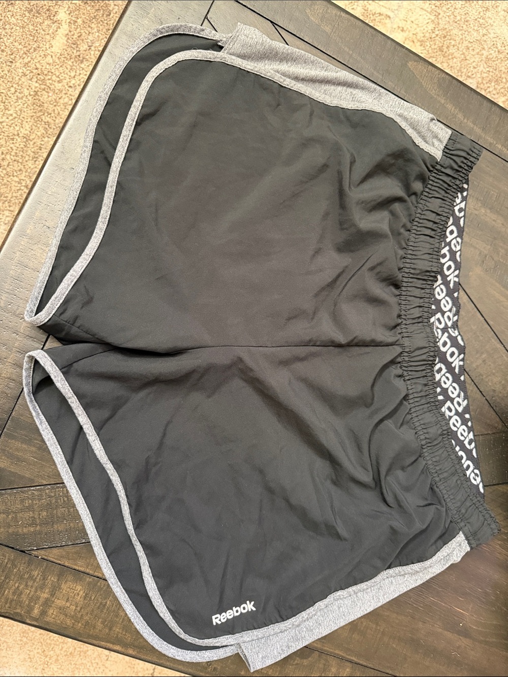 Reebok Black Athletic Shorts with Gray Trim and Logo Waistband